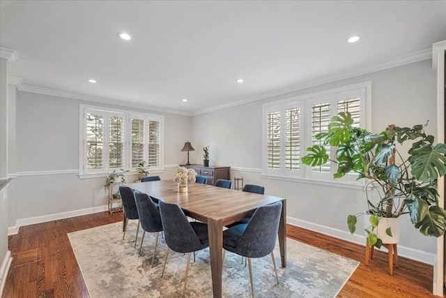 dining area featuring wood finished floors, recessed lighting, and baseboards