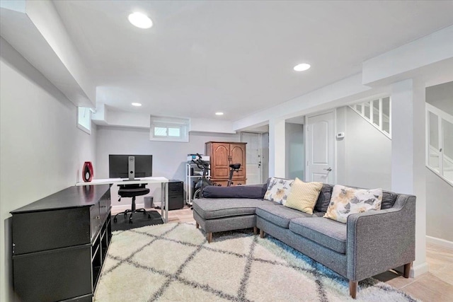 living room featuring recessed lighting, stairs, and baseboards