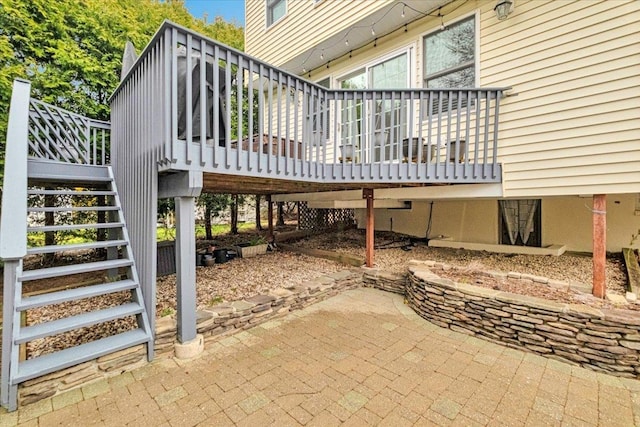 view of patio / terrace with stairs and a wooden deck