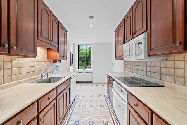 341 Furnace Dock Rd Unit 5, Cortlandt Manor, NY 10567 - kitchen with a sink, white appliances, radiator heating unit, light flooring, and baseboards