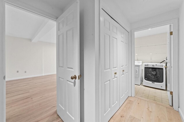 341 Furnace Dock Rd Unit 5, Cortlandt Manor, NY 10567 - corridor with separate washer and dryer, light wood-style floors, and baseboards