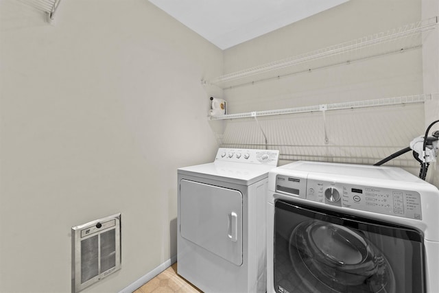 341 Furnace Dock Rd Unit 5, Cortlandt Manor, NY 10567 - laundry area featuring heating unit, washer and dryer, and baseboards