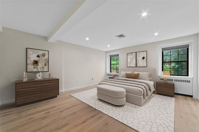 341 Furnace Dock Rd Unit 5, Cortlandt Manor, NY 10567 - bedroom featuring light wood-style floors, radiator, recessed lighting, baseboards, and beamed ceiling
