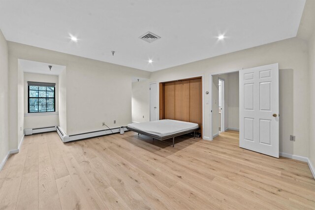 341 Furnace Dock Rd Unit 5, Cortlandt Manor, NY 10567 - unfurnished bedroom with light wood finished floors, baseboards, recessed lighting, and a closet