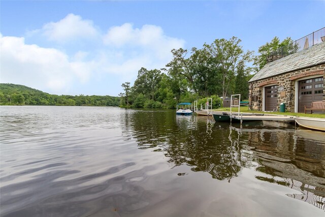 341 Furnace Dock Rd Unit 5, Cortlandt Manor, NY 10567 - water view featuring a boat dock and a heavily wooded area