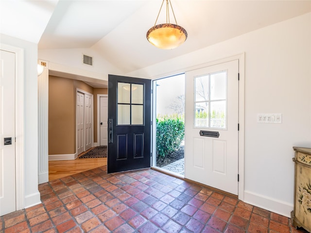 4 Terrace Ct, Port Washington, NY 11050 - foyer entrance with baseboards and lofted ceiling