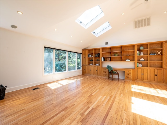 4 Terrace Ct, Port Washington, NY 11050 - unfurnished office featuring light wood-type flooring, a skylight, high vaulted ceiling, recessed lighting, and baseboards