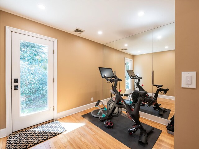 4 Terrace Ct, Port Washington, NY 11050 - exercise room featuring wood finished floors, baseboards, and recessed lighting