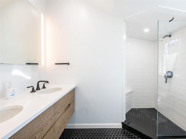 4 Terrace Ct, Port Washington, NY 11050 - full bath featuring a tile shower, tile patterned flooring, double vanity, and baseboards