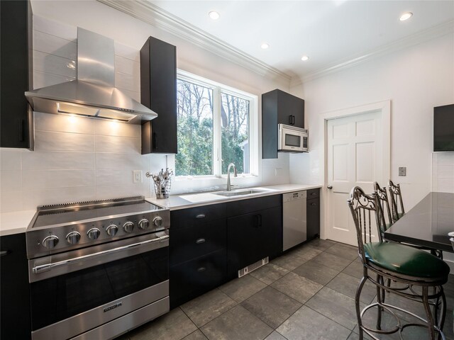 4 Terrace Ct, Port Washington, NY 11050 - kitchen with stainless steel appliances, wall chimney range hood, dark cabinets, decorative backsplash, and crown molding