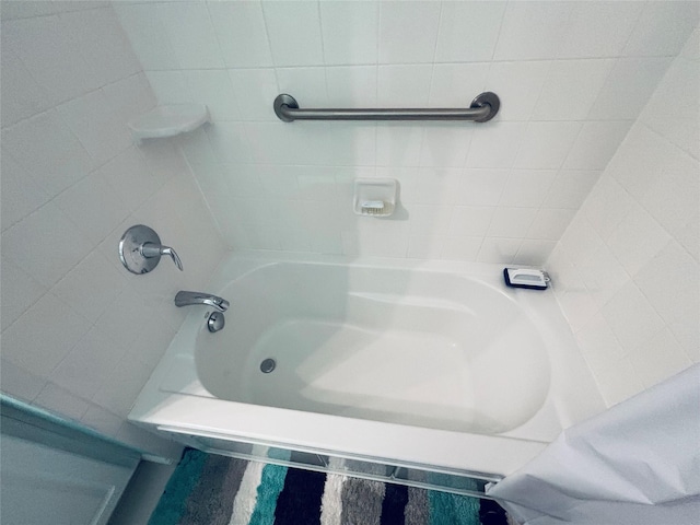 full bathroom featuring  shower combination