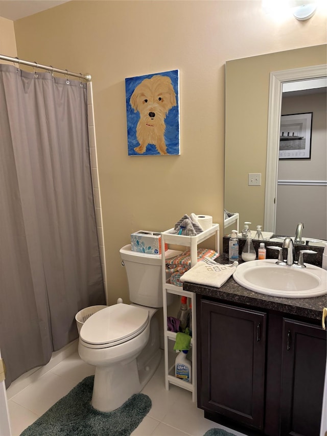 full bath with toilet, curtained shower, tile patterned flooring, and vanity