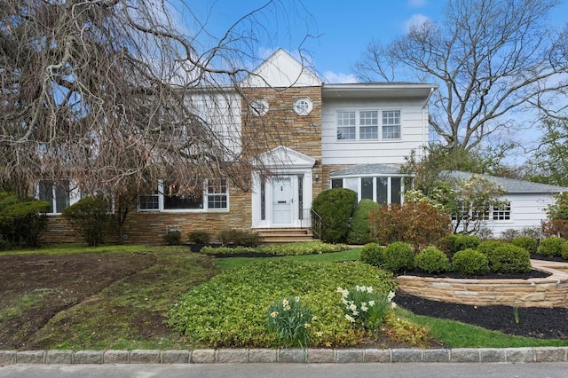270 Bayberry Dr, Hewlett Harbor, NY 11557 - view of front facade featuring stone siding and entry steps