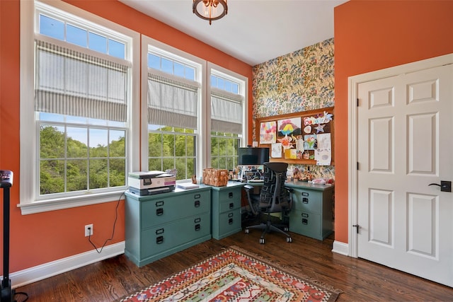 home office featuring healthy amount of natural light, baseboards, and dark wood-style floors