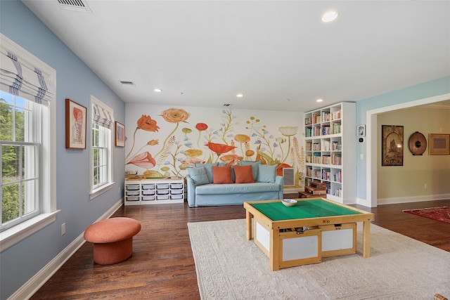 playroom with wood finished floors, recessed lighting, and baseboards