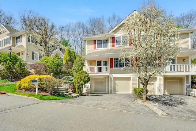 8 Alder Way, Armonk, NY 10504 - view of front of home featuring driveway, stairway, and an attached garage