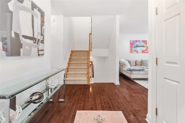 8 Alder Way, Armonk, NY 10504 - hallway featuring dark wood finished floors and stairs
