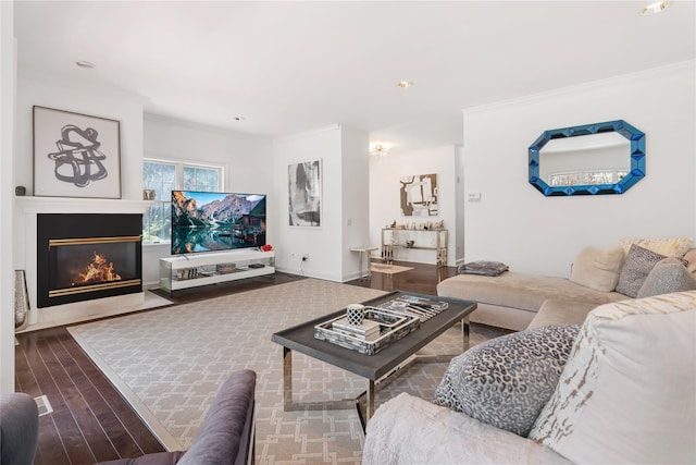 8 Alder Way, Armonk, NY 10504 - living area with recessed lighting, wood finished floors, a fireplace with flush hearth, and crown molding