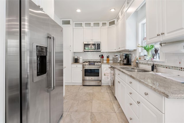 8 Alder Way, Armonk, NY 10504 - kitchen featuring white cabinetry, appliances with stainless steel finishes, and a sink