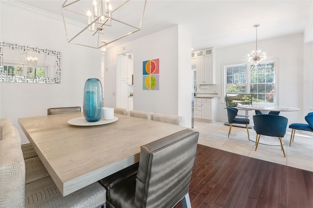 8 Alder Way, Armonk, NY 10504 - dining room with ornamental molding, wood finished floors, plenty of natural light, and a notable chandelier