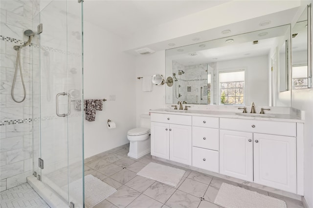 8 Alder Way, Armonk, NY 10504 - bathroom featuring a stall shower, double vanity, a sink, and marble finish floor