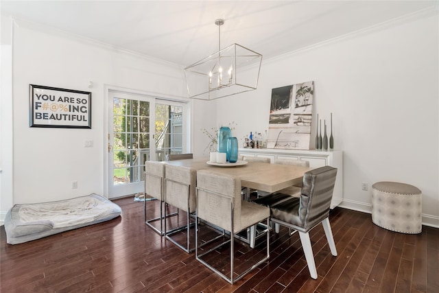 8 Alder Way, Armonk, NY 10504 - dining area featuring crown molding, an inviting chandelier, baseboards, and dark wood-type flooring