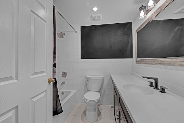 13 Iris Cir, Beacon, NY 12508 - full bathroom with vanity, shower / bath combo with shower curtain, toilet, tile walls, and tile patterned floors