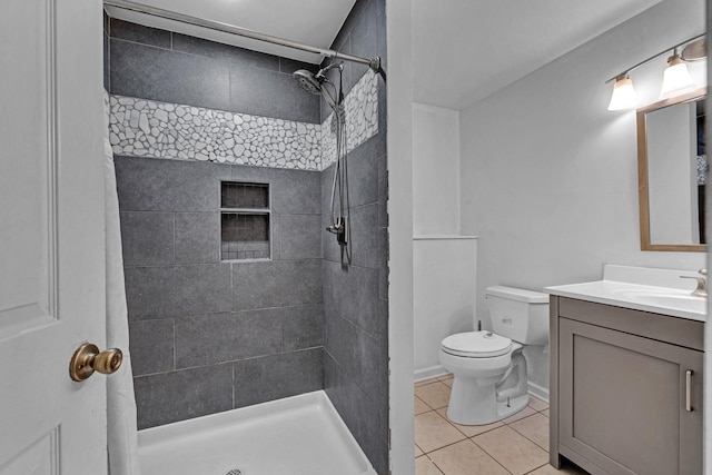 13 Iris Cir, Beacon, NY 12508 - full bath featuring vanity, tile patterned flooring, a shower stall, and toilet