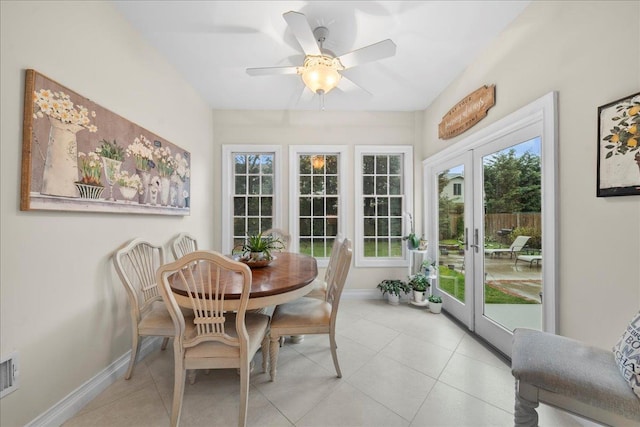 sunroom with a healthy amount of sunlight and french doors