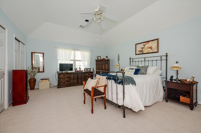 bedroom featuring visible vents, ceiling fan, and light colored carpet