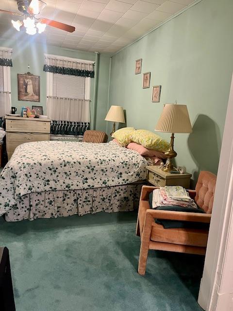 bedroom featuring carpet flooring and ceiling fan