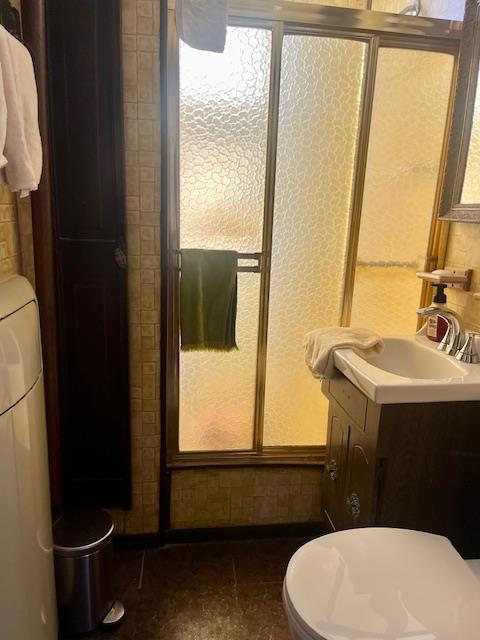 bathroom with toilet and vanity