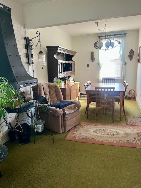 dining area with carpet
