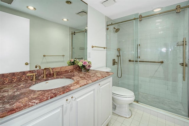 55 Waters Edge Unit 55, Rye, NY 10580 - bathroom with vanity, tile patterned floors, a shower stall, and recessed lighting