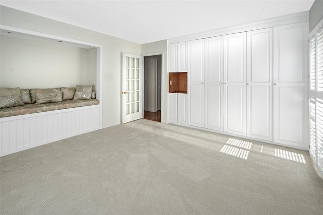 55 Waters Edge Unit 55, Rye, NY 10580 - unfurnished living room with carpet floors