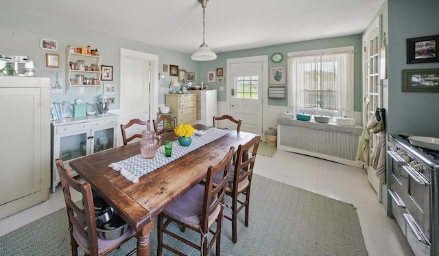 535 Beechwoods Rd, Callicoon, NY 12723 - dining room featuring radiator and a wainscoted wall