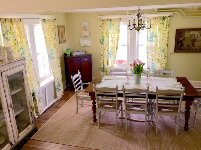 535 Beechwoods Rd, Callicoon, NY 12723 - dining room with a chandelier and wood finished floors