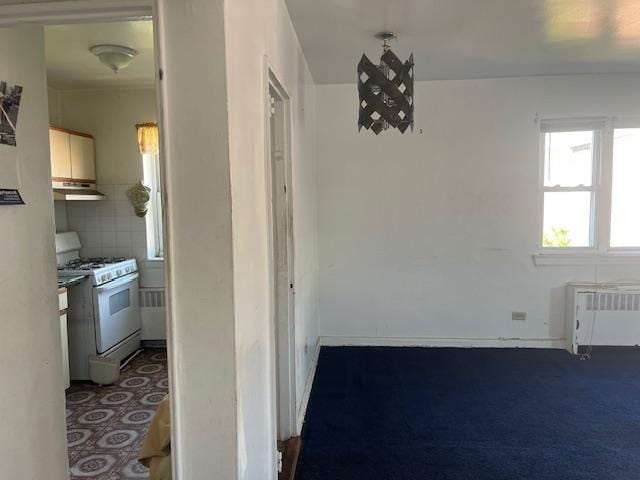 20-25 Parsons Blvd, Whitestone, NY 11357 - unfurnished dining area featuring radiator heating unit