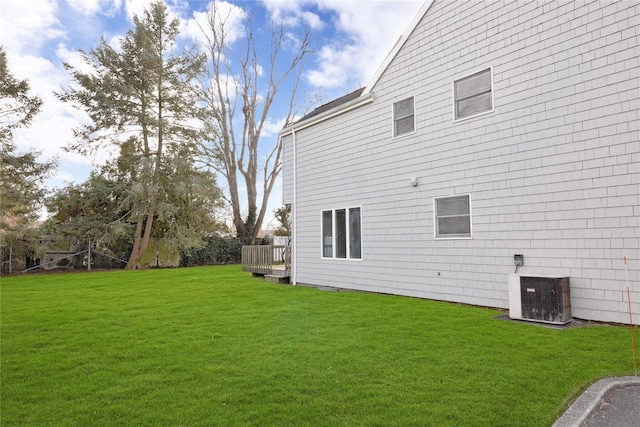 8 Beach Manor Ct, West Islip, NY 11795 - exterior space featuring a yard, a deck, and central AC
