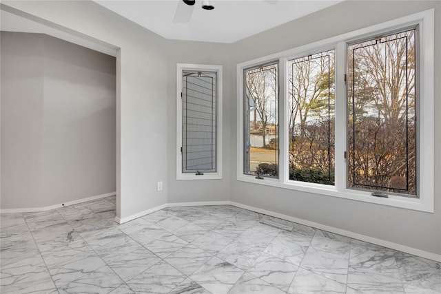 8 Beach Manor Ct, West Islip, NY 11795 - empty room featuring baseboards, a ceiling fan, and marble finish floor