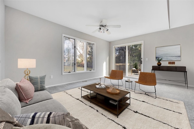 8 Beach Manor Ct, West Islip, NY 11795 - carpeted living room with ceiling fan and baseboards
