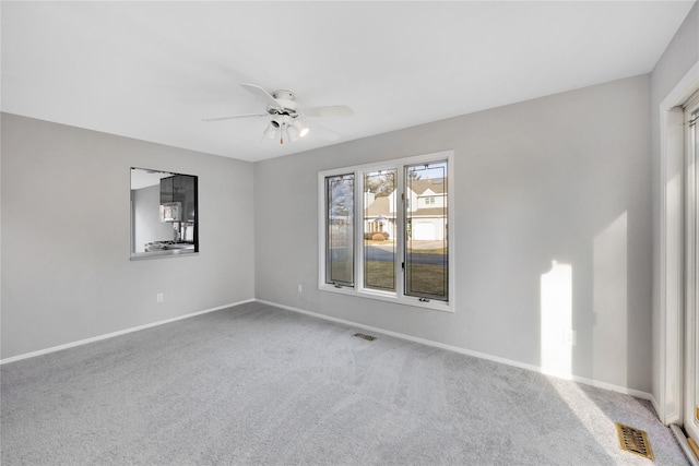 8 Beach Manor Ct, West Islip, NY 11795 - unfurnished room with visible vents, ceiling fan, carpet flooring, and baseboards