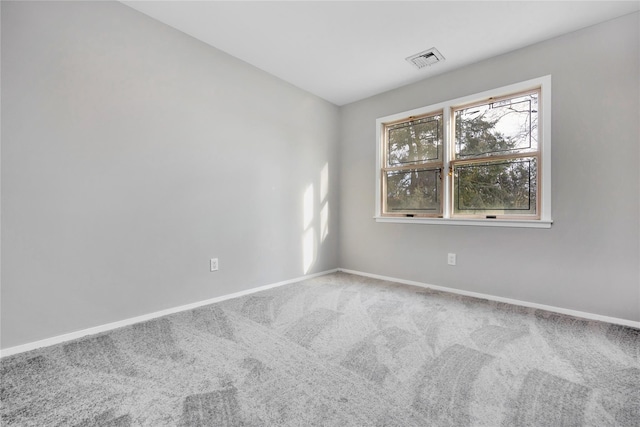 8 Beach Manor Ct, West Islip, NY 11795 - spare room featuring visible vents, baseboards, and carpet flooring