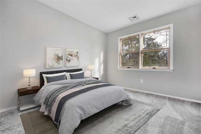 8 Beach Manor Ct, West Islip, NY 11795 - carpeted bedroom with visible vents and baseboards