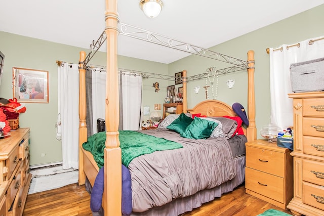bedroom with light wood-type flooring