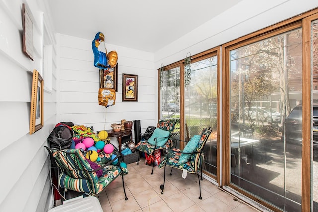 sunroom with tile patterned flooring