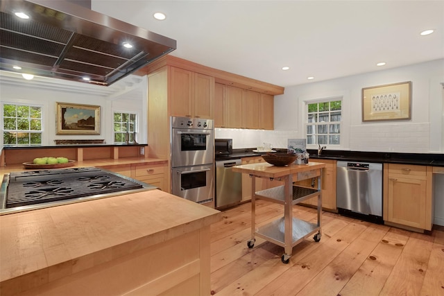 27 Dingle Ridge Rd, North Salem, NY 10560 - kitchen with stainless steel appliances, wall chimney exhaust hood, light brown cabinetry, healthy amount of natural light, and recessed lighting