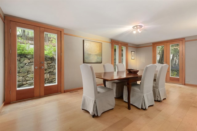 27 Dingle Ridge Rd, North Salem, NY 10560 - dining space featuring french doors, light wood-style floors, and healthy amount of natural light