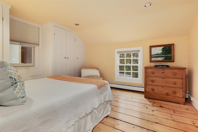 27 Dingle Ridge Rd, North Salem, NY 10560 - bedroom featuring a baseboard radiator, light wood-type flooring, vaulted ceiling, and recessed lighting