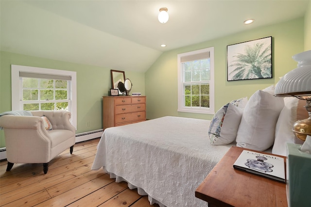 27 Dingle Ridge Rd, North Salem, NY 10560 - bedroom featuring light wood finished floors, lofted ceiling, multiple windows, a baseboard heating unit, and recessed lighting